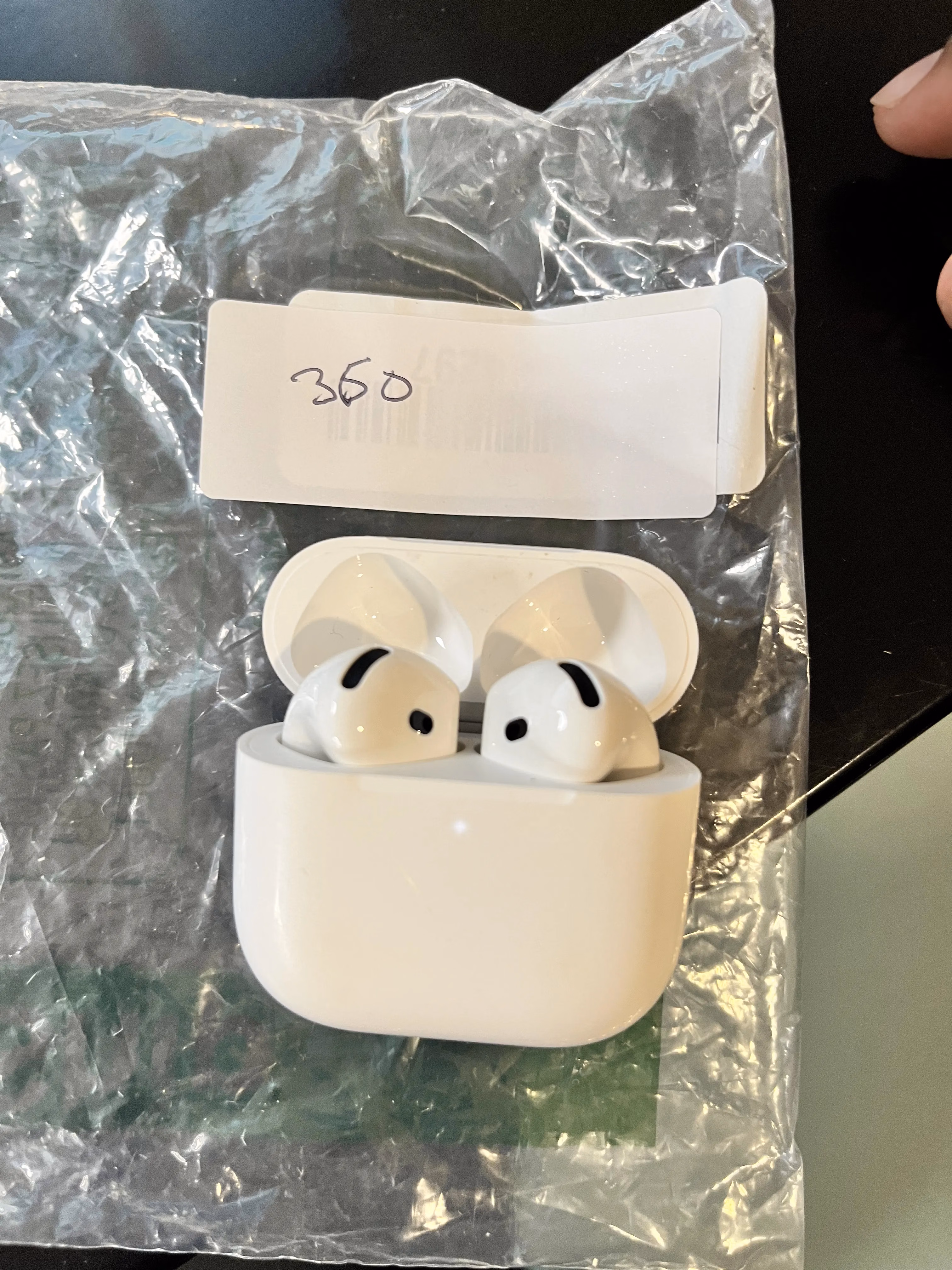 Apple AirPods 4 Wireless Earbuds, Bluetooth Headphones, with Active Noise Cancellation, Adaptive, Transparency Mode, Personalized Spatial Audio, USB-C Charging Case, Wireless Charging, H2 Chip thumbnail 2
