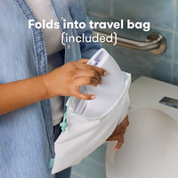 Frida Baby Fold-and-Go Portable Potty Seat for Toilet, Foldable Travel Potty Seat for Toddler, Fits Round & Oval Toilets, Non-Slip Base, Handles, Includes Free Travel Bag thumbnail 5