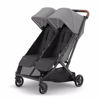 UPPAbaby Minu Duo Side-by-Side Double Stroller - Lightweight + Compact Design for Travel - Easy Fold- From Birth to Toddler - Independent Recline -Greyson(Charcoal Mélange/Carbon Frame/Saddle Leather) thumbnail 1